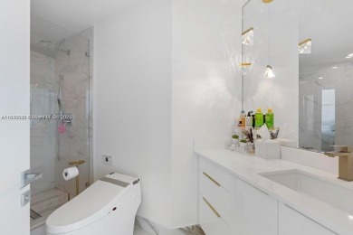 Step inside this rare, '01' line residence at the Portofino