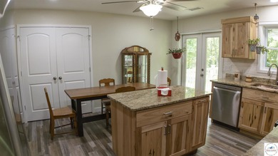 ABSOLUTELY STUNNING lake home right off of Hwy UU and just 3.4