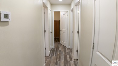 ABSOLUTELY STUNNING lake home right off of Hwy UU and just 3.4