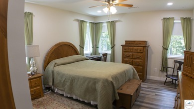 ABSOLUTELY STUNNING lake home right off of Hwy UU and just 3.4