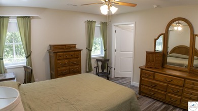 ABSOLUTELY STUNNING lake home right off of Hwy UU and just 3.4