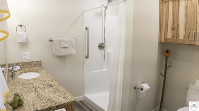 ABSOLUTELY STUNNING lake home right off of Hwy UU and just 3.4