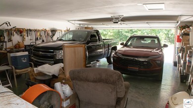 ABSOLUTELY STUNNING lake home right off of Hwy UU and just 3.4