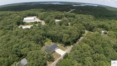 ABSOLUTELY STUNNING lake home right off of Hwy UU and just 3.4