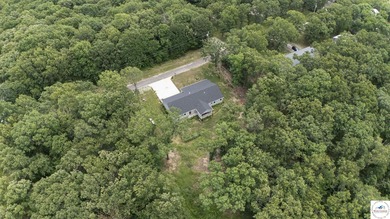 ABSOLUTELY STUNNING lake home right off of Hwy UU and just 3.4