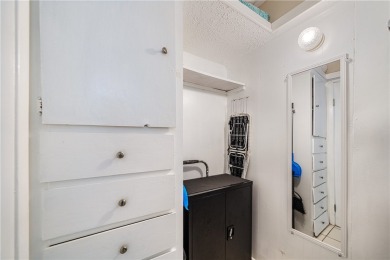 Fully furnished first floor corner condo that offers a compact