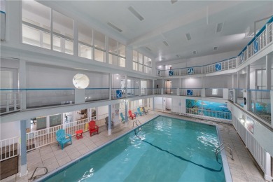 Fully furnished first floor corner condo that offers a compact