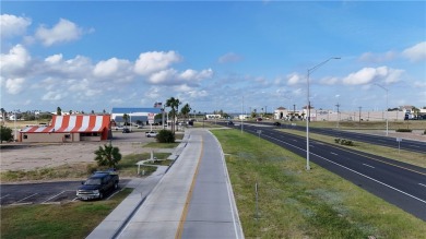 Fully furnished first floor corner condo that offers a compact