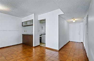 Spacious and freshly painted 1-bedroom, 1-bath condo featuring a