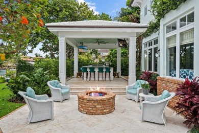 RIO VISTA! This stunning waterfront estate boasts 5 BD | 5 BA |