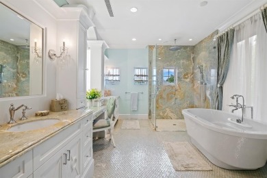 RIO VISTA! This stunning waterfront estate boasts 5 BD | 5 BA |