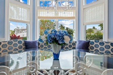 RIO VISTA! This stunning waterfront estate boasts 5 BD | 5 BA |