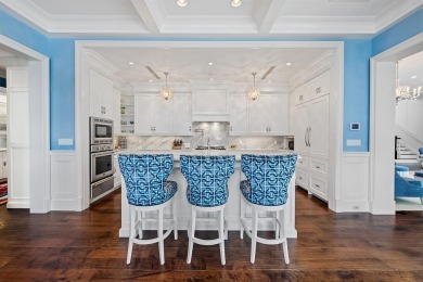 RIO VISTA! This stunning waterfront estate boasts 5 BD | 5 BA |