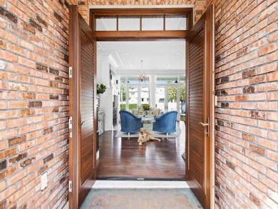 RIO VISTA! This stunning waterfront estate boasts 5 BD | 5 BA |