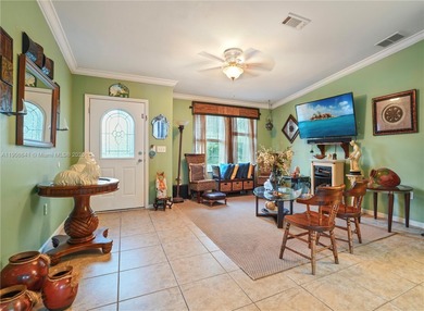 MOTIVATED SELLER! Nestled between lakes and lush greenery is