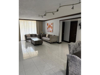 Looking to experience coastal living? This cozy split floor plan