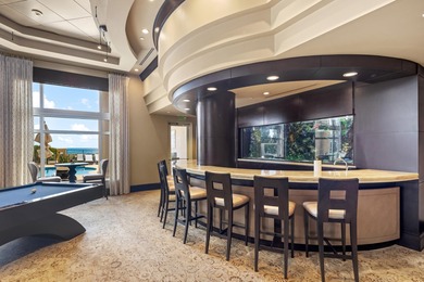 Welcome to Penthouse 903 at Luxuria--an iconic, two-story sky