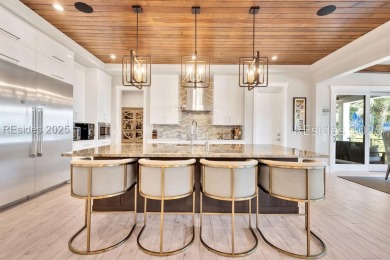 Experience unparalleled coastal luxury in this extraordinary