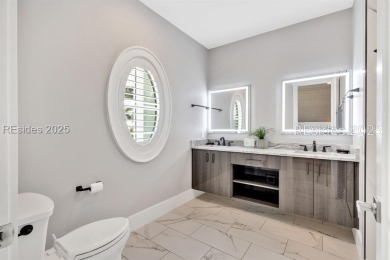 Experience unparalleled coastal luxury in this extraordinary