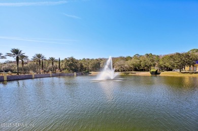 TOP FLOOR END UNIT OVERLOOKING THE LAKE & FOUNTAIN. Spacious