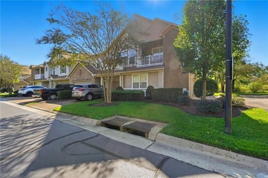 Second story condo with elevator. Covered balcony.  Large open