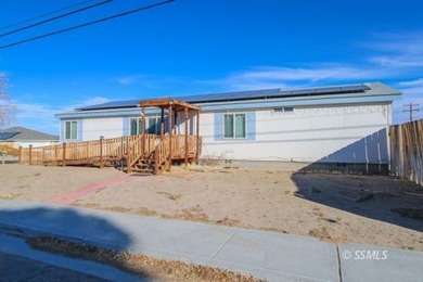 This well-maintained manufactured home is situated on a