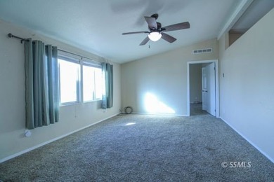 This well-maintained manufactured home is situated on a