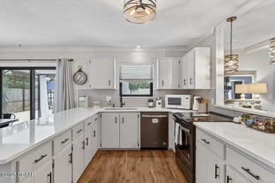 Beautifully updated 4-bedroom, 2.5-bath pool home in the