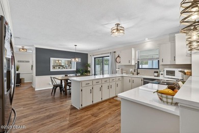 Beautifully updated 4-bedroom, 2.5-bath pool home in the