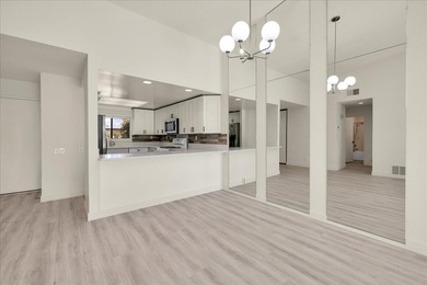 Located in the iconic Rose Garden community in central Palm