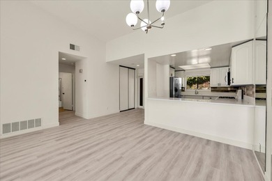 Located in the iconic Rose Garden community in central Palm