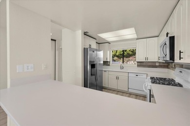 Located in the iconic Rose Garden community in central Palm