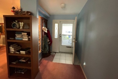 Located on a spacious corner lot in the sought-after gated