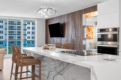 Live the beachfront lifestyle in this spacious 2BD/2BA residence