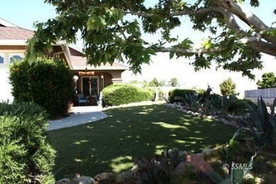 This immaculate home sits on a spacious corner lot, fully