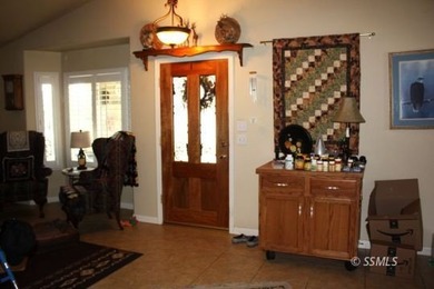 This immaculate home sits on a spacious corner lot, fully