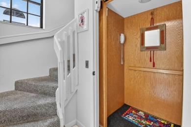 This two bedroom plus den, two full bath condo offers care-free