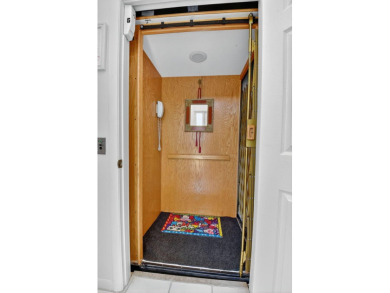 This two bedroom plus den, two full bath condo offers care-free