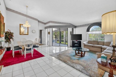 This two bedroom plus den, two full bath condo offers care-free