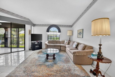 This two bedroom plus den, two full bath condo offers care-free