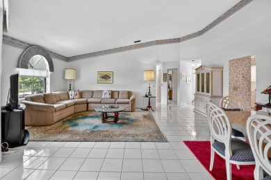 This two bedroom plus den, two full bath condo offers care-free