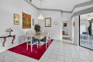 This two bedroom plus den, two full bath condo offers care-free