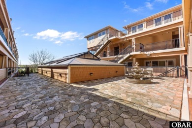 Oceanfront luxury condo!  This second floor *flat* is located in