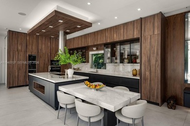 This luxury masterpiece estate, set on nearly one acre, features