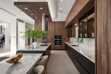 This luxury masterpiece estate, set on nearly one acre, features