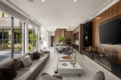 This luxury masterpiece estate, set on nearly one acre, features