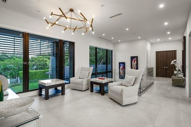 This luxury masterpiece estate, set on nearly one acre, features