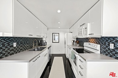 Welcome to Unit 207 in Kingswood Court, ideally located in one