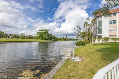 GATED COMMUNITY***First floor Corner Unit condo with lots of