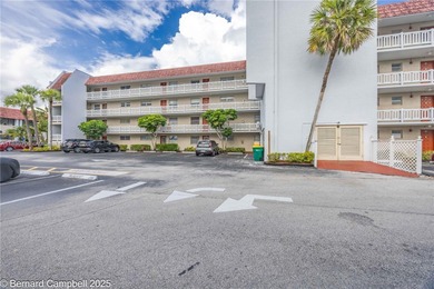 GATED COMMUNITY***First floor Corner Unit condo with lots of